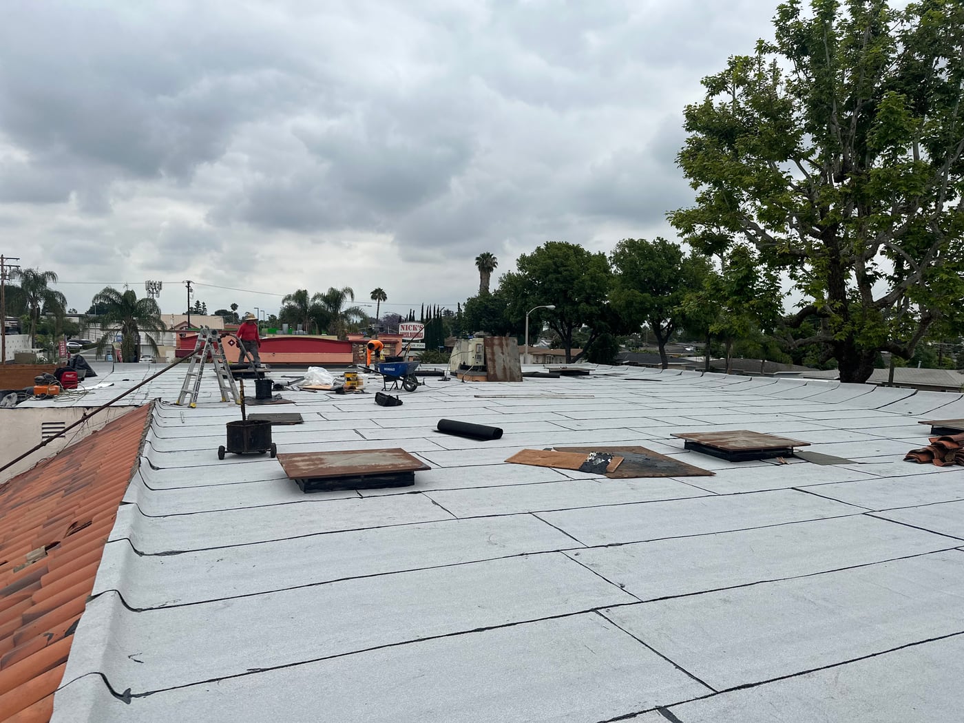 Commercial flat roof replacement in progress